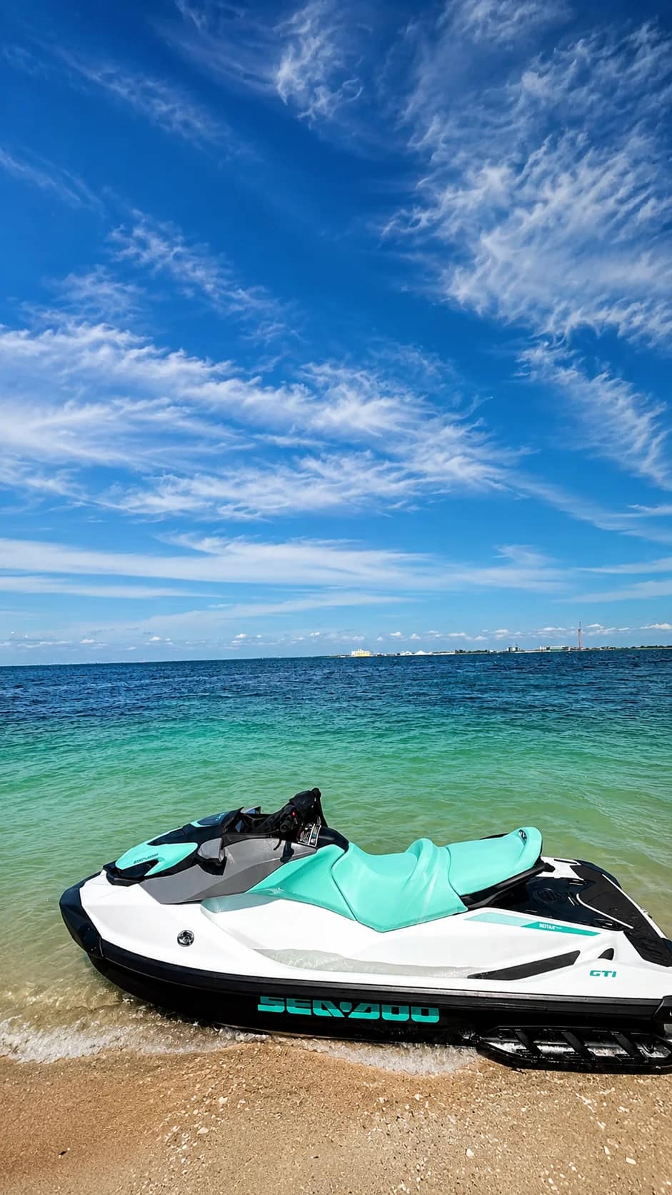 Jet ski on turquoise water near the shore